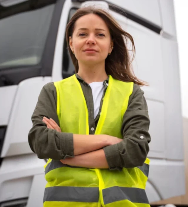 Woman in front of a truck 2
