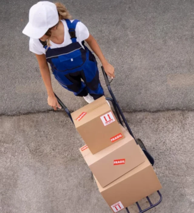 Woman moving boxes 2