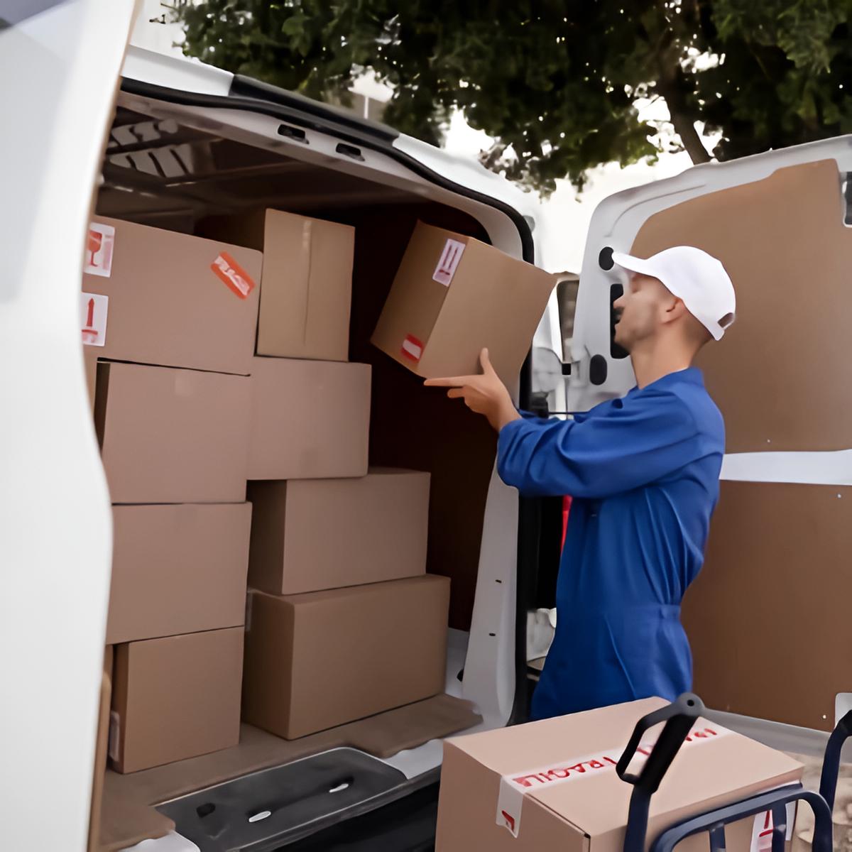 person-loading-boxes-into-a-van