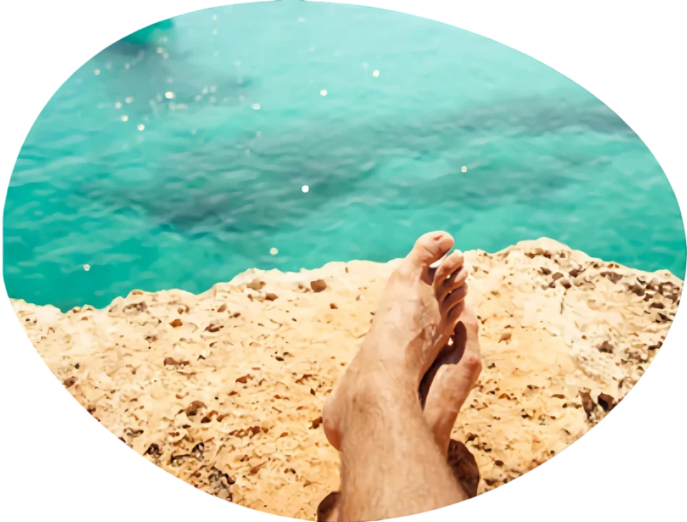 one person-on-rock-on-beach