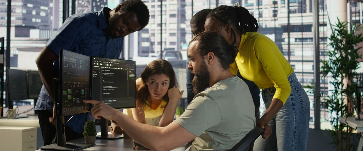 Team of young programmers working